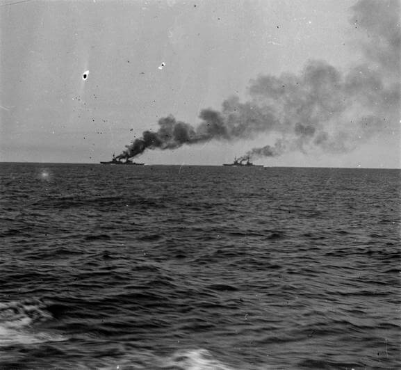 HMS Inflexible and Invincible seen from HMS Kent during the pursuit of the German squadron in the Battle of the Falkland Islands on 8th December 1914