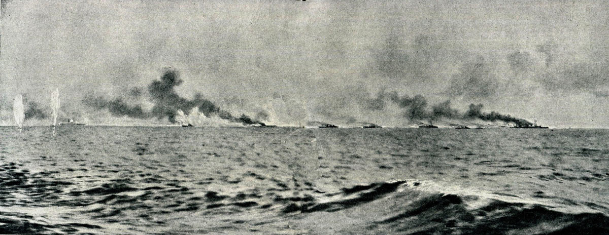 Fourth of a sequence of photographs of the opening stages of the Battle Cruiser action at the Battle of Jutland 31st May 1916 taken by Paymaster Lieutenant Duckworth from HMS Birmingham. The vertical white clouds are spouts of water put up by exploding heavy calibre shells