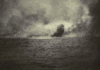 British Battle Cruiser HMS Indefatigable exploding after being repeatedly hit by shellfire at the Battle of Jutland on 31st May 1916. Photograph taken during the battle