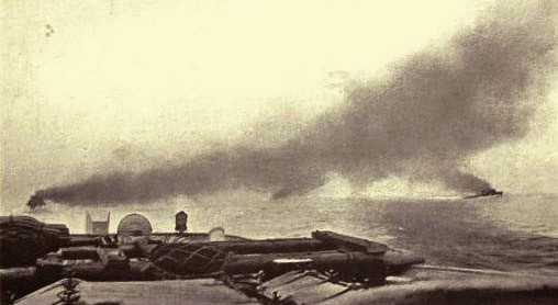 Commencement of the Battle of Jutland on 31st May 1916. British battle cruisers are in the distance behind the smoke line: contemporary photograph taken from the light cruiser HMS Champion