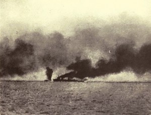 Second of a series of photographs taken from a British destroyer at the Battle of Jutland on 31st May 1916 showing salvos of German shells landing short of HMS Lion: contemporary photograph taken from a British destroyer