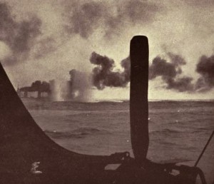 Third of a series of photographs taken from a British destroyer at the Battle of Jutland on 31st May 1916 showing salvos of German shells landing short of HMS Lion: contemporary photograph taken from a British destroyer