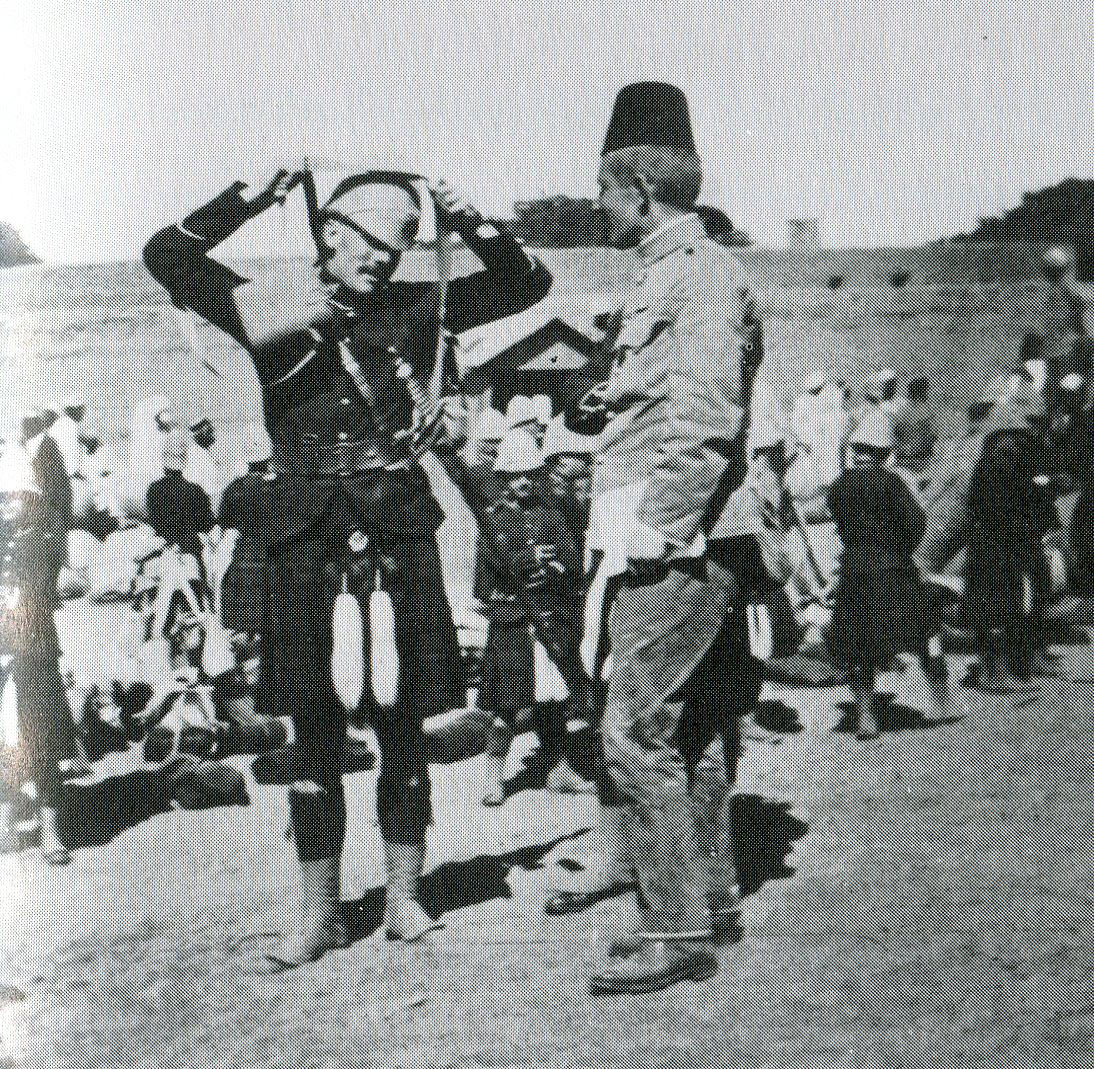 Cameron Highlanders officer and an officer of an Egyptian Regiment in the desert: Battle of Atbara on 8th April 1898 in the Sudanese War