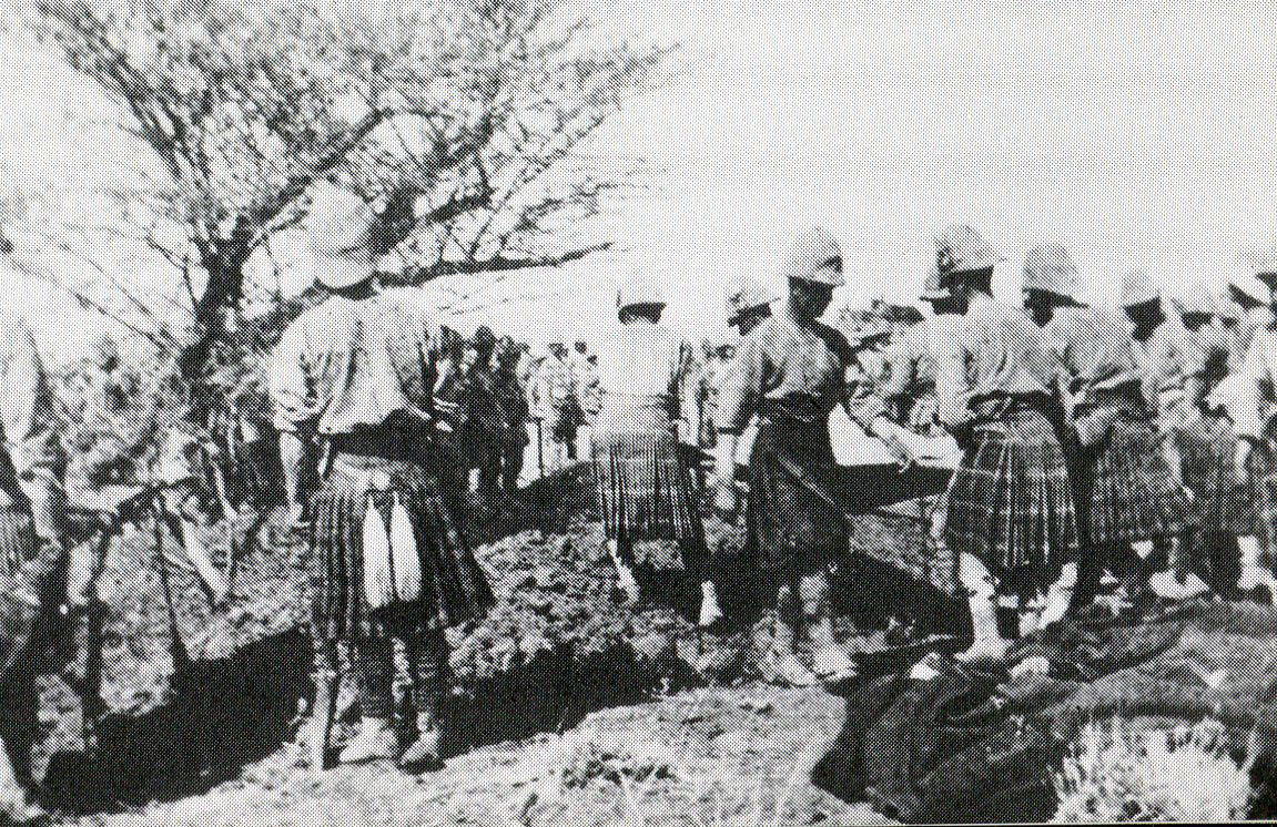 Seaforth and Cameron Highlanders burying their dead after the Battle of Atbara on 8th April 1898 in the Sudanese War