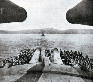 The 15 inch guns of HMS Queen Elizabeth with the coast of the Dardanelles in the distance: Gallipoli campaign Part I: the Naval Bombardment, March 1915 in the First World War