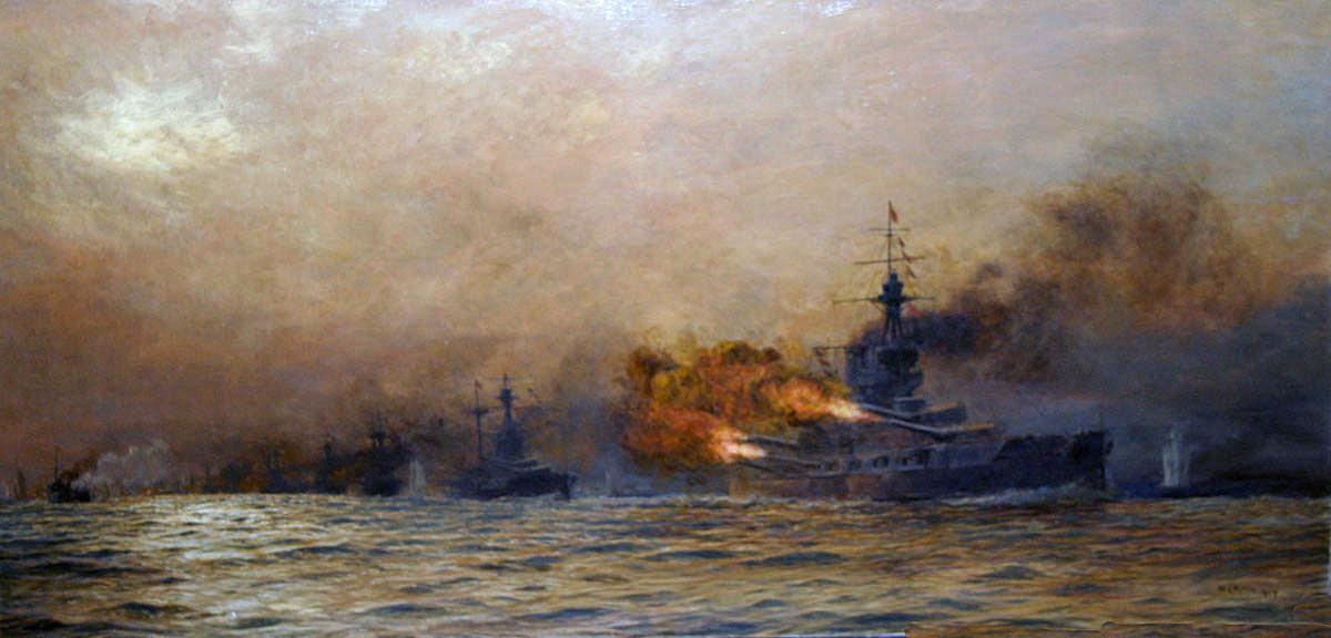HMS Iron Duke Admiral Jellicoe’s Flagship opening fire at approximately 6.15pm on 31st May 1916 at the Battle of Jutland. Iron Duke is followed by other British Battleships. The ship on the extreme left of the picture is the disabled British destroyer HMS Acasta: picture by Lionel Wyllie