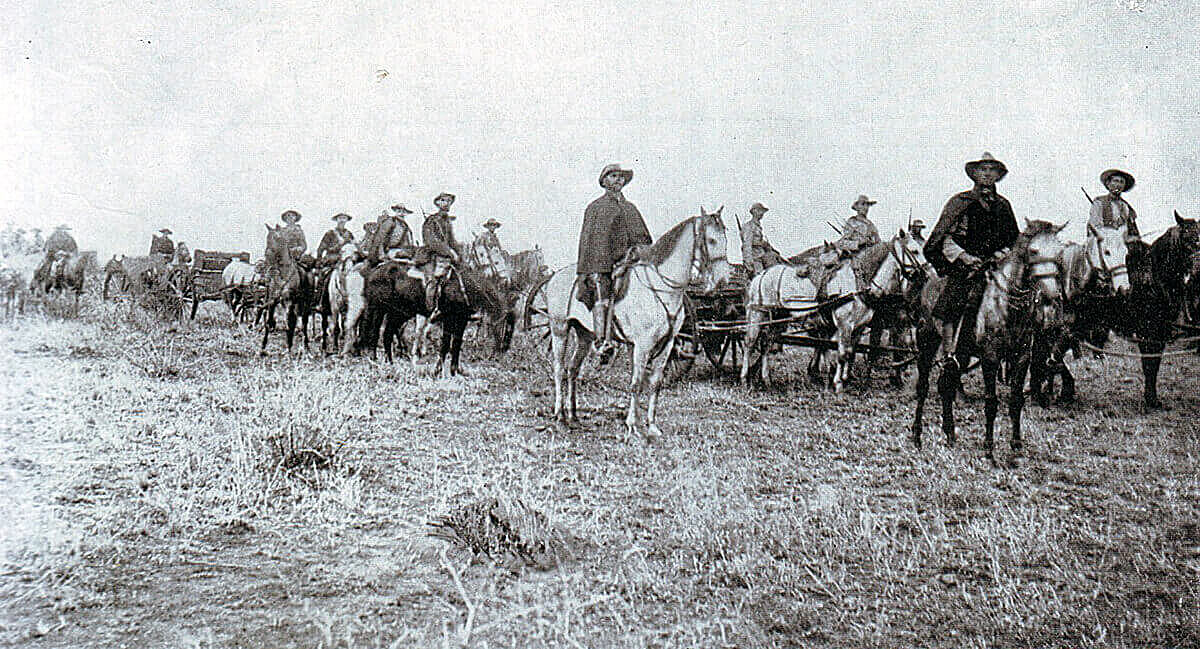 Boers with a Maxim machine gun on a carriage during the Boer War