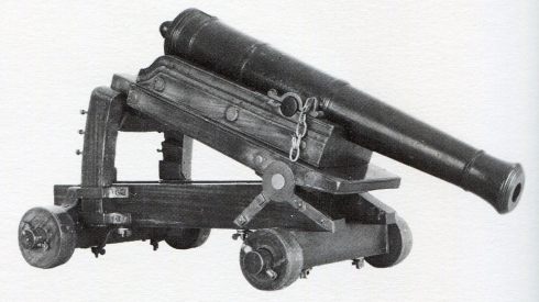 24-pounder cannon on a 'depressing gun carriage' devised by Lieutenant Koehler, adc to General Eliott, which enabled a gun to be fired from high on the Rock down into the Spanish siege works on the Isthmus:: the Great Siege of Gibraltar from 1779 to 1783 during the American Revolutionary War